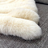PUFFY FAUX FUR THROW