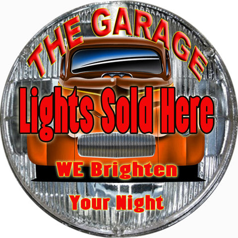 The garage Lights Sold Here Metal Sign